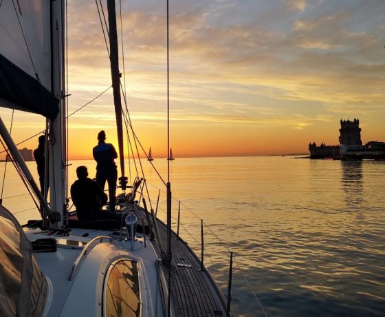 People looking to the ocean Lisbon