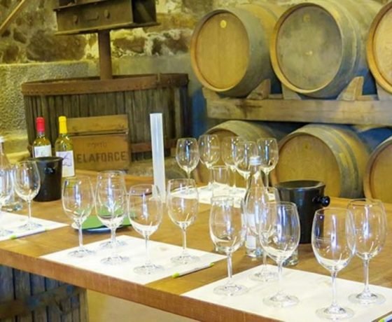 Table set to with empty wine glasses